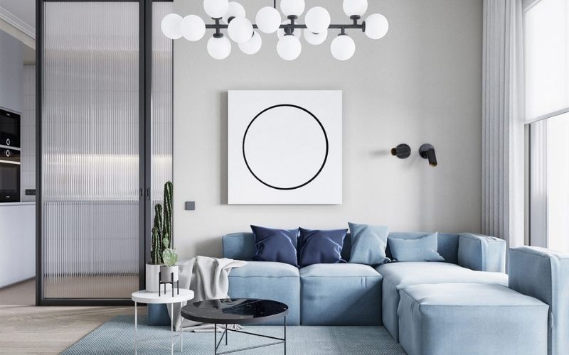 Phòng khách màu trắng sứ kết hợp sofa màu xanh mang lại cảm giác thanh lịch Phòng khách màu trắng sứ kết hợp sofa màu xanh mang lại cảm giác thanh lịch