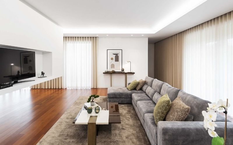 Trần giật cấp kín cho phòng khách chung cư với gam màu trắng nổi bật Trần giật cấp kín cho phòng khách chung cư với gam màu trắng nổi bật