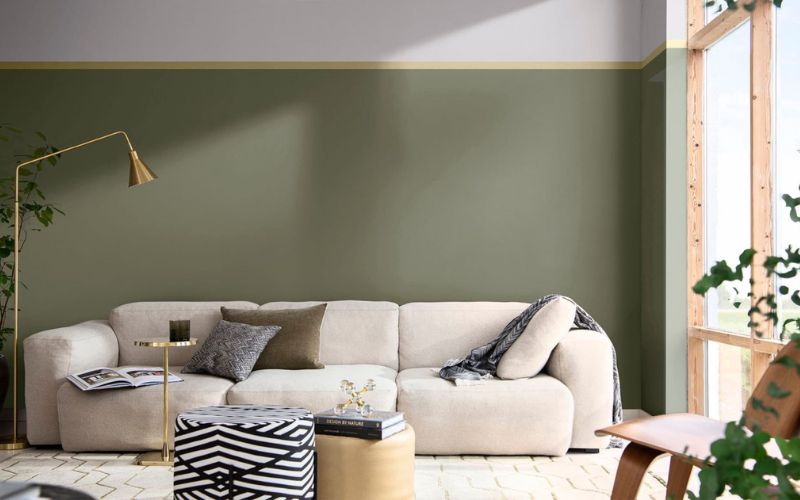 Phòng khách màu xanh rêu hiện đại kết hợp cây xanh tươi mát