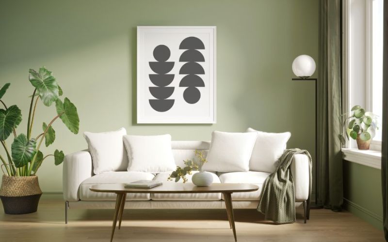 Phòng khách màu xanh rêu nhạt kết hợp sofa màu trắng trang nhã