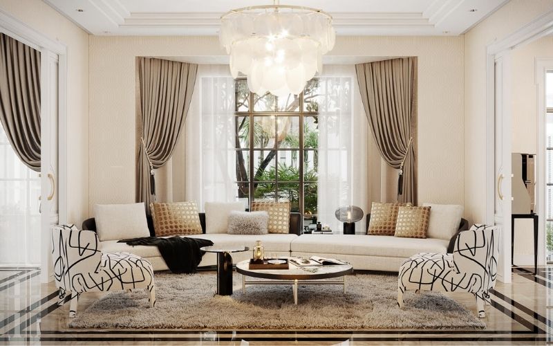 Sơn tường màu trắng sữa kết hợp sofa họa tiết tạo cảm giác nhẹ nhàng