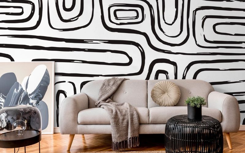 Phòng khách cá tính với mặt tường được sơn trừu tượng