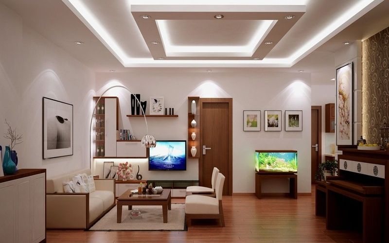 Trần thạch cao hình vuông tích hợp đèn led mang đến không gian phòng khách ấm cúng, hiện đại