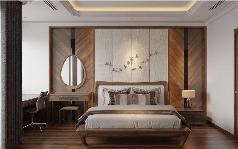 Phòng ngủ vợ chồng thiết kế trần giật cấp bo góc mang lại không gian ấm cúng, thoải mái