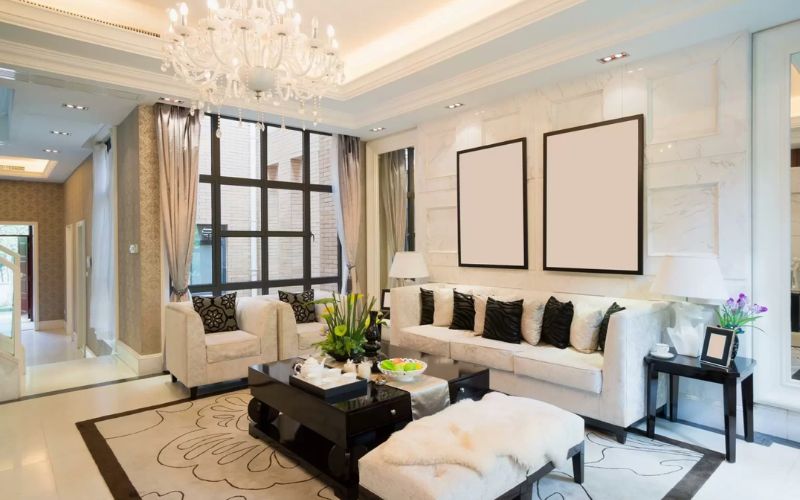 Những đường nét trần thạch cao giật cấp giúp không gian phòng khách trở nên ấn tượng, cuốn hút